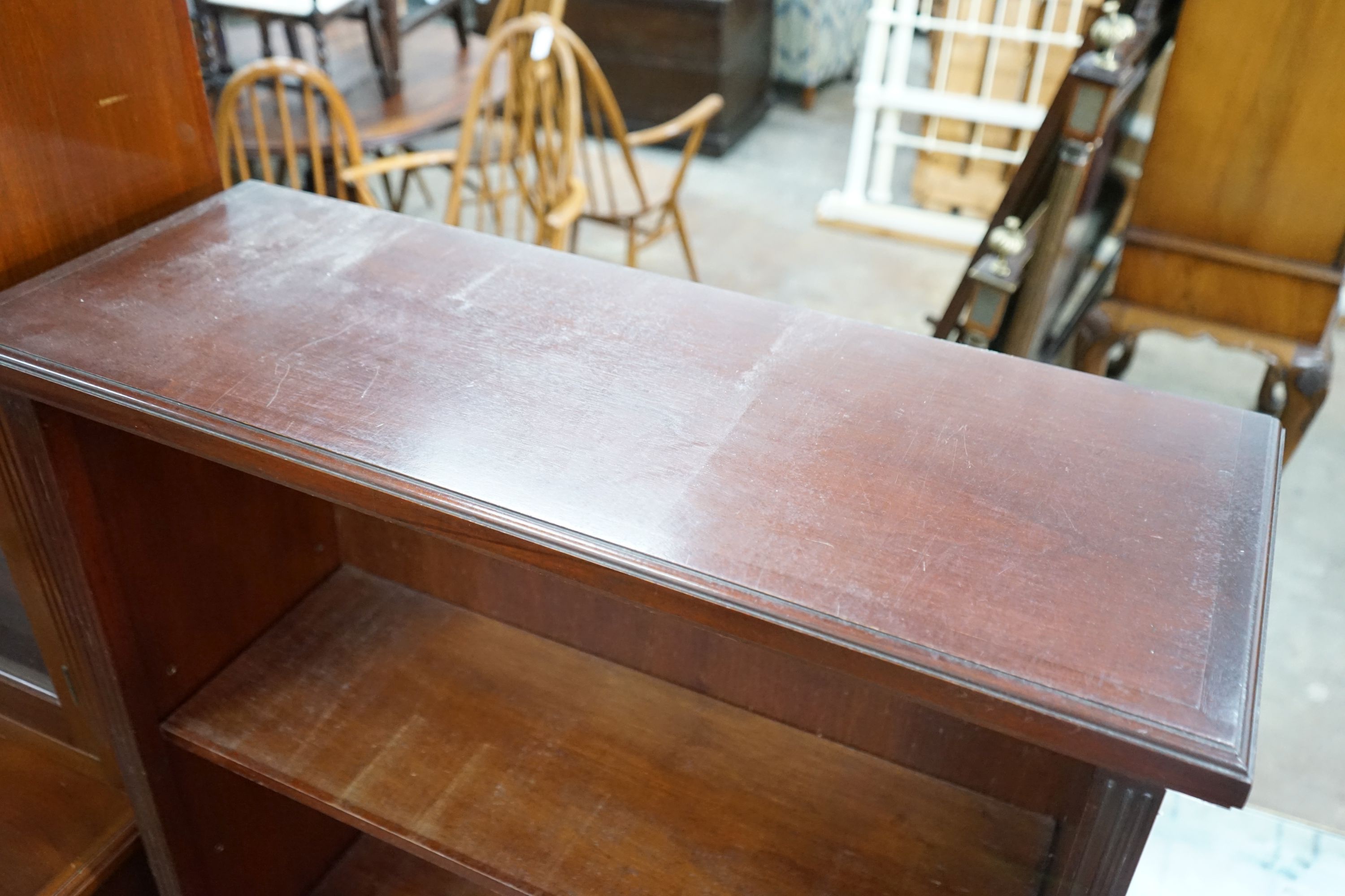 A reproduction mahogany open bookcase, width 90cm, depth 34cm, height 137cm